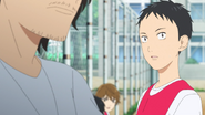 Tetsu talking with the coach 
