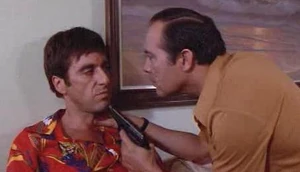 Hector amenazando a Tony.