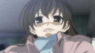 Sekai's mad smile when she pushes Kotonoha into the train