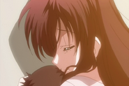 Kotonoha cuddles Makoto's severed head