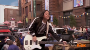 Tomika and the band having a concert on the streets. (Hold on Loosely)