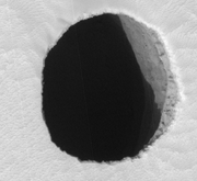 Possible cave entrance on Arsia Mons