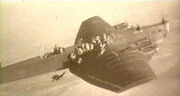 Paratroopers jumping from Tupolev TB-3