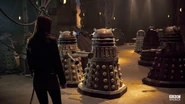 Amy encounters inmates of the Dalek Asylum.