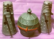 Two daleks and a mechanoid.
