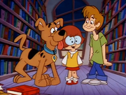 Velma congratulates Shaggy and Scooby for solving the mystery.png