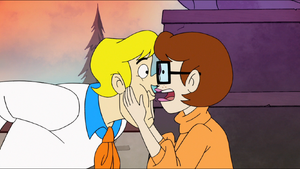 Velma holding Fred's face