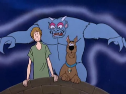 Moon Monster behind Shaggy and Scooby.png