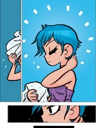 Ramona takes off her towel, unveiling a new haircut.