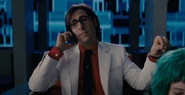 Gideon continues to tease Scott on the phone.