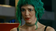 Ramona Flowers (with green hair) held captive by Gideon.