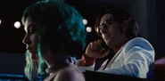 Gideon looks over Ramona whilst phoning Scott.