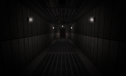 The grated hallway, before SCP-106 walks across.
