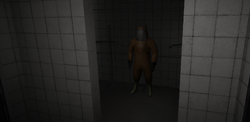 The hazmat suit found in the storage area.