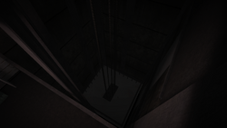 The elevator shaft.