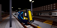 An NGv3 Class 380 standing at night in Berrily Depot