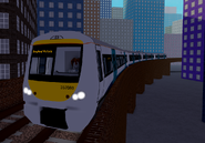 A Class 357 approaching Financial Quarter, bound for Stepford Victoria.