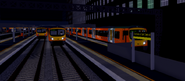 Three Class 185s stopping at Airport Central.