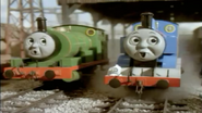 Thomas and Percy are scared after Cranky drops the timber in Cranky Bugs