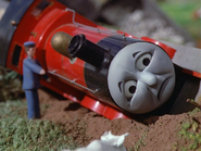 Poor James feels sad after he was pushed by the trucks and came off the tracks