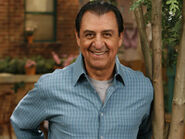 Luis (played by Emilio Delgado)