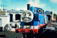 A photo of Thomas at Tidmouth Sheds, notably used as the cover art for the VHS release of Thomas Gets Tricked