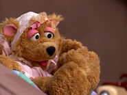 Curly Bear (voiced by Stephanie D'Abruzzo)