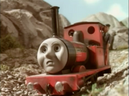 Rheneas is scared when he sees the boulder come to flatten him in Rusty and the Boulder