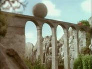 Boulder chases Rheneas in Rusty and the Boulder