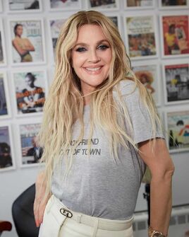 Drew Barrymore wearing her iconic shirt in 2024 that she wore at the premiere of Charlie's Angels: Full Throttle in 2003.