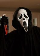 Ghostface holds knife