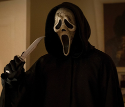 Watch Ghostface dodge bullets and wield a shotgun in a new Scream