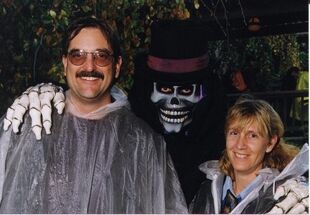 Picture taken by two guests with the Phantom in the queue of Phantom Manor in the 1990's, in the gazebo area.