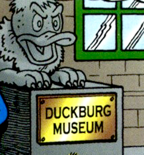 In Don Rosa's stories, he depicted the lion statues at the Museum's entrance with duck beaks.