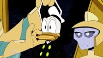 Lunaris placing a strap on Donald to keep him from talking
