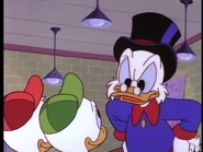 Scrooge fumbles over his words.
