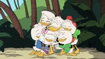 Donald, Della, Melon and the kids joining in on a group hug