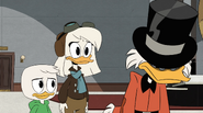 Della and Louie with a frustrated Scrooge