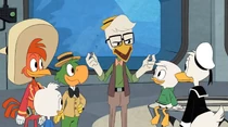 Gyro handing the earbud communicators to the group