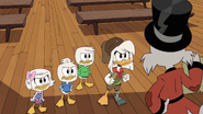 Della and the kids mad at Scrooge...