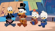 Donald and the family playing the drums