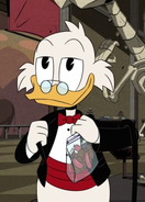 Scrooge in a black tuxedo in "The Golden Lagoon of White Agony Plains!"