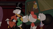 Louie shaking scrooge