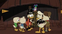 The family discovering the secret compartment