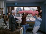 2x11 family throwing Carla.jpg