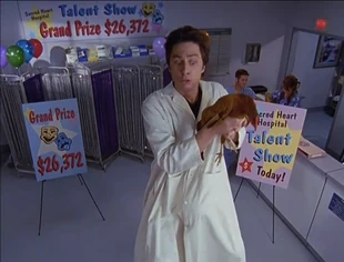 In J.D.'s fantasy, he and Turk perform "World's Most Giant Doctor goes to the Farm" ("My Life in Four Cameras")