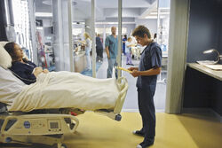 9x1 Cole with patient.jpg