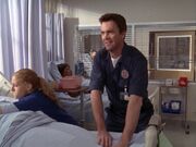 5x19-Lisa and Janitor help patient