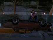 2x14 JD's car flipped