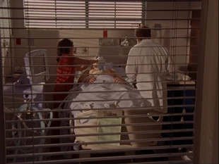 Dr. Cox and Carla unsuccessfully try to save the third and final patient - Dave.